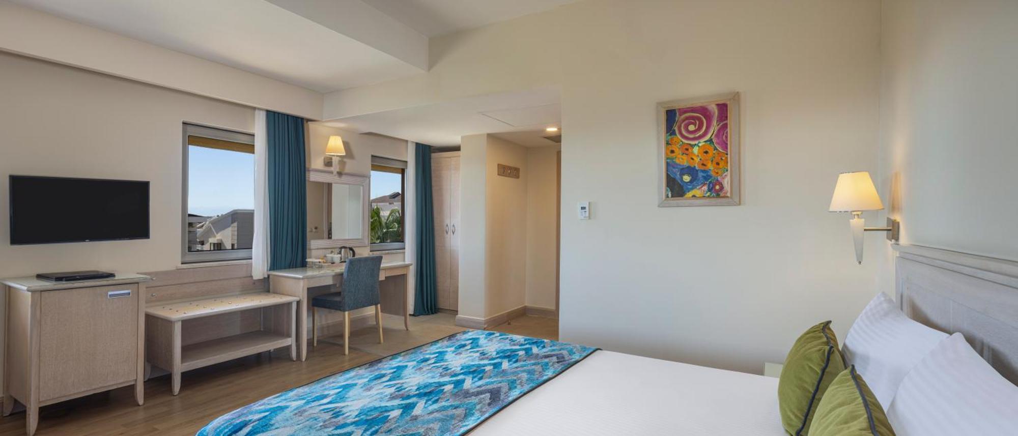 Doppel-/Zweibettzimmer mit Balkon